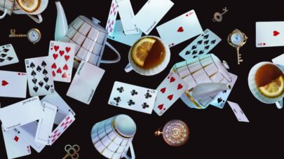 Alice in Wonderland theme cards teapot teacup clocks