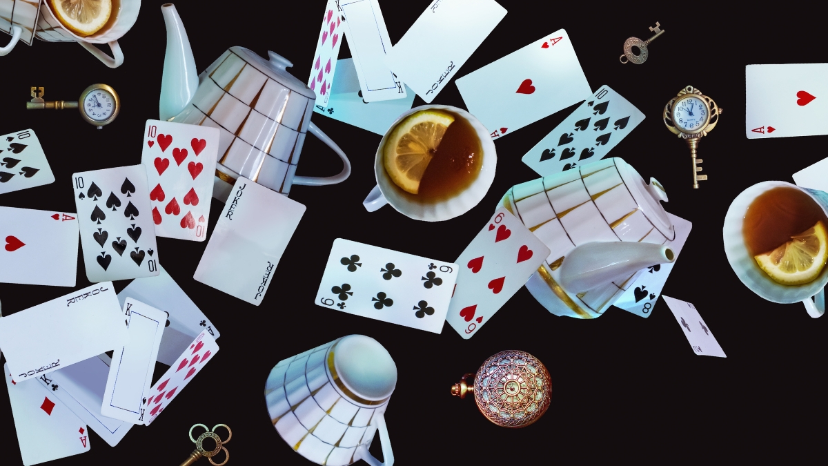 Alice in Wonderland theme cards teapot teacup clocks